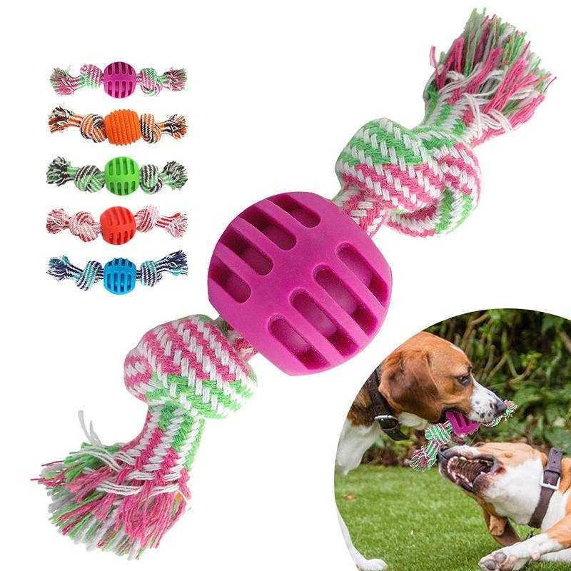 Jouet balle et corde résistante pour chiens en rose, idéal pour le jeu interactif et la dentition.