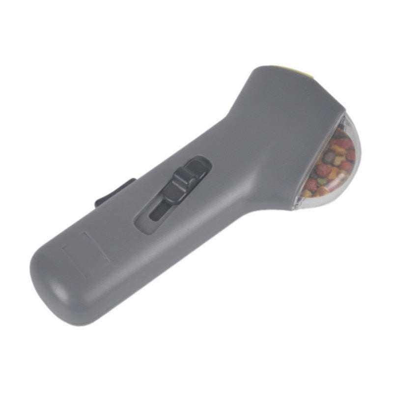 Interactive dog treat dispenser in sleek gray design.
