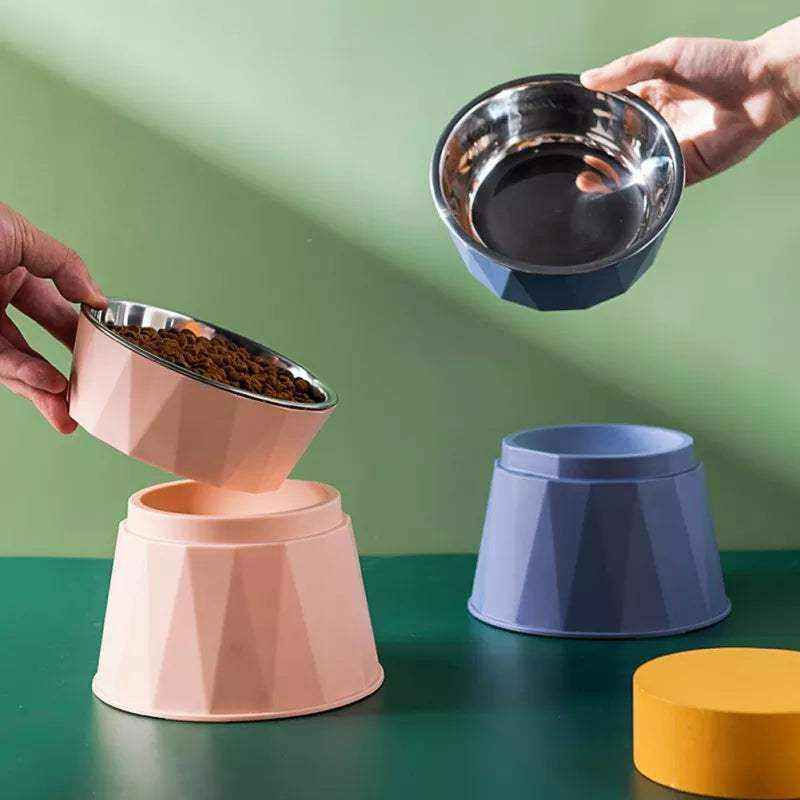 Gamelle élevée pour animaux en acier inoxydable avec base anti-basculement, disponible en rose et bleu, pour une alimentation confortable et stable