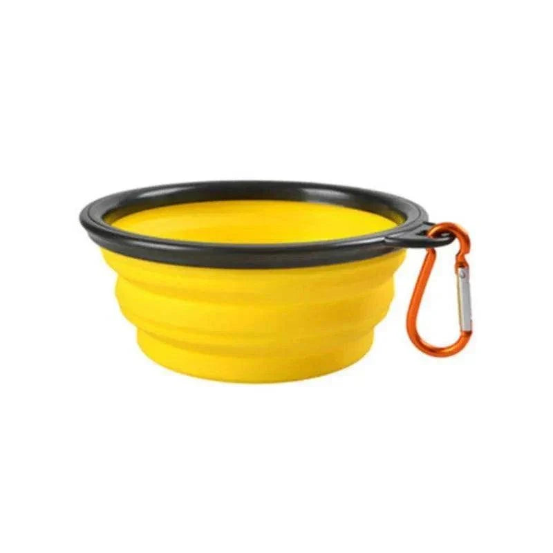 Bol portable en silicone pliable jaune pour chiens et chats avec mousqueton, idéal pour nourriture et eau en voyage.