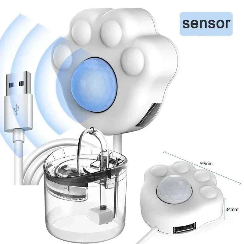 Capteur intelligent forme patte pour fontaine à eau animaux avec détecteur de mouvement et connexion USB.