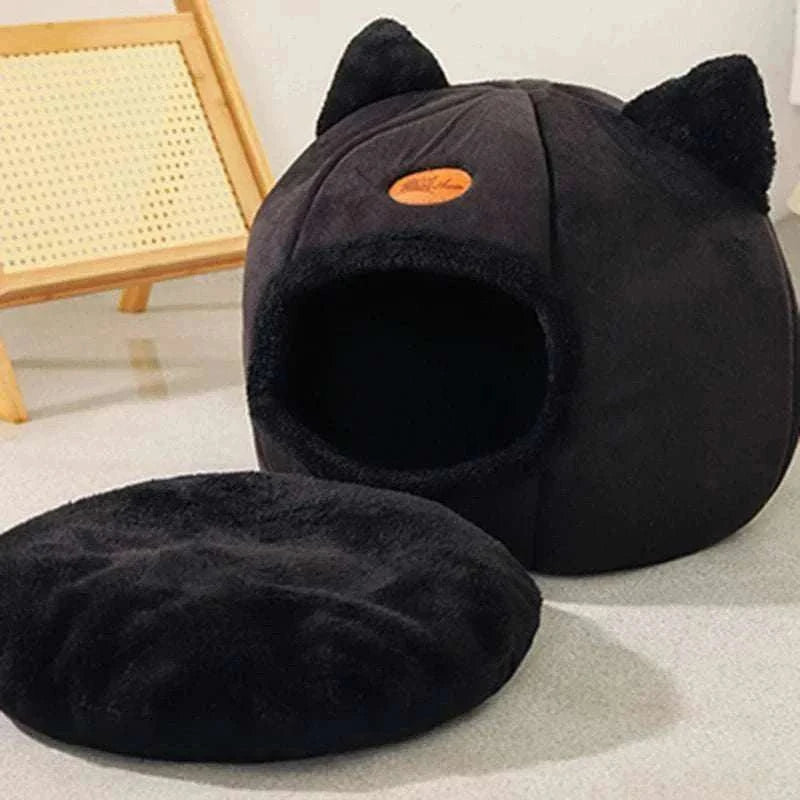 Maison pour chat noire en forme de tête avec oreilles, lit douillet semi-fermé en peluche, base antidérapante, adaptée 4 saisons.