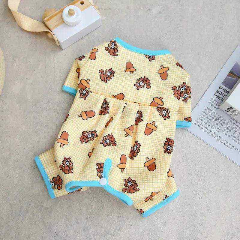 pyjama jaune pour petits chiens et chats avec motifs glands et animaux, bordures bleues, confort et style pour animaux de compagnie
