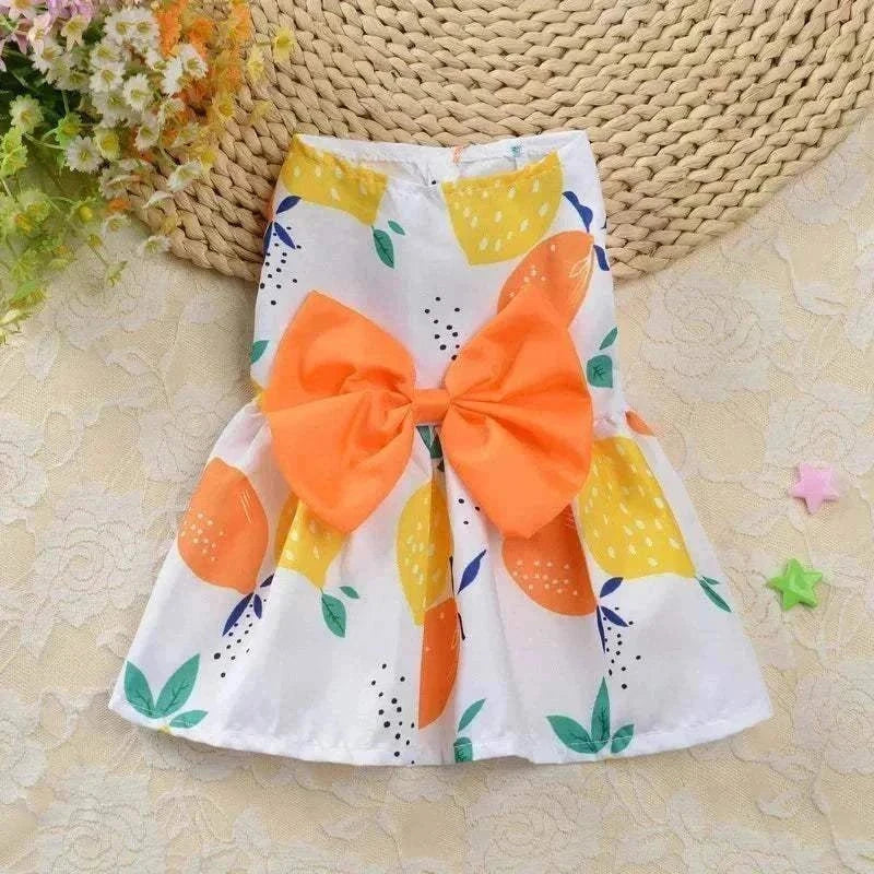 Princess-style floral robe for small dogs and cats with bow and fruit motifs.