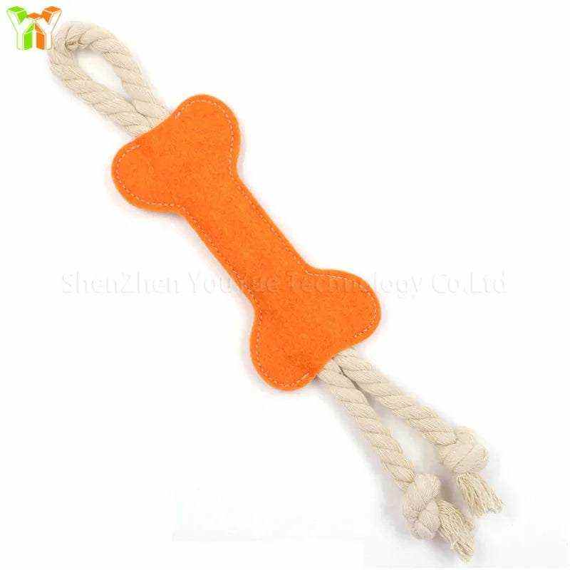 Os à mâcher pour chien en feutre orange avec corde résistante pour soin dentaire et entraînement interactif.