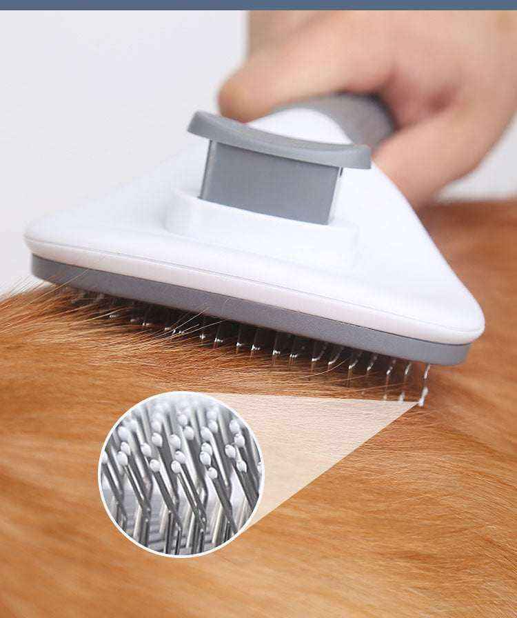 Brosse automatique One-Click grise avec picots métalliques pour éliminer facilement les poils morts de chiens et chats.