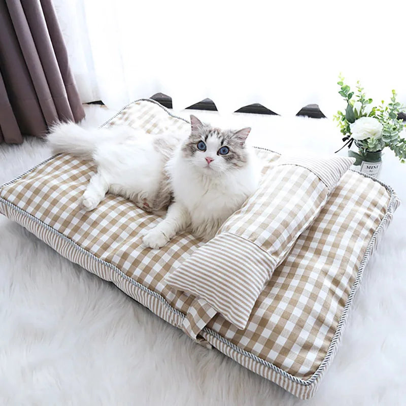 Ultra-soft, breathable pet bed for dogs and cats with plaid design and non-slip base.