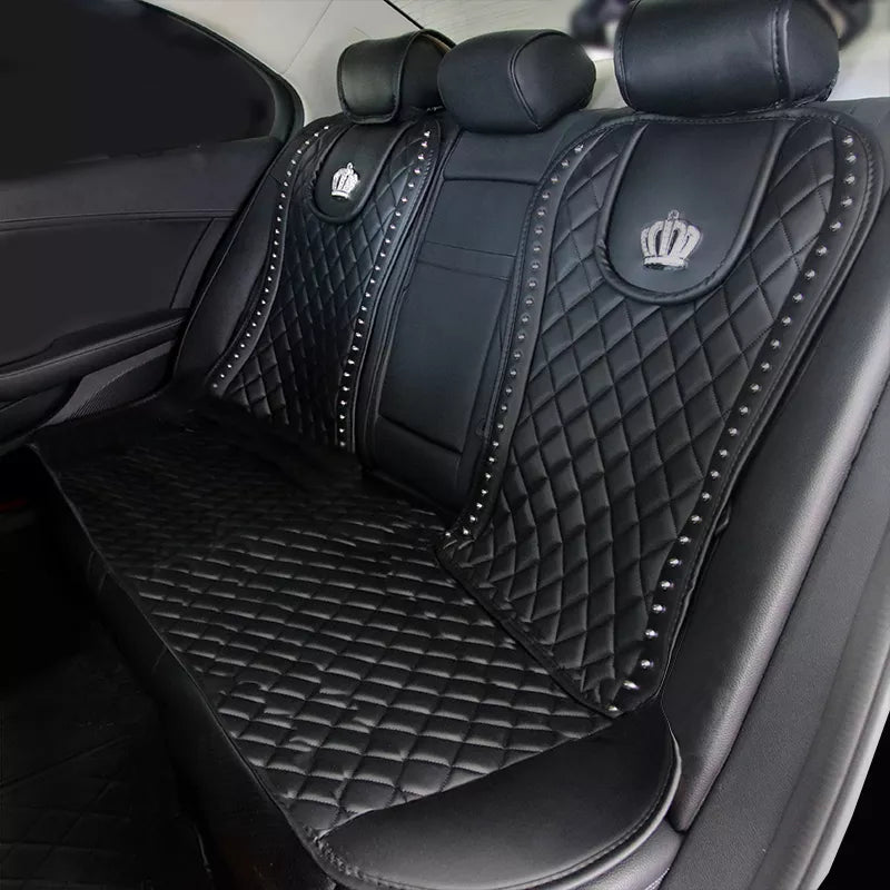Housse de siège auto en cuir PU avec rivets couronne, design élégant et protection durable.