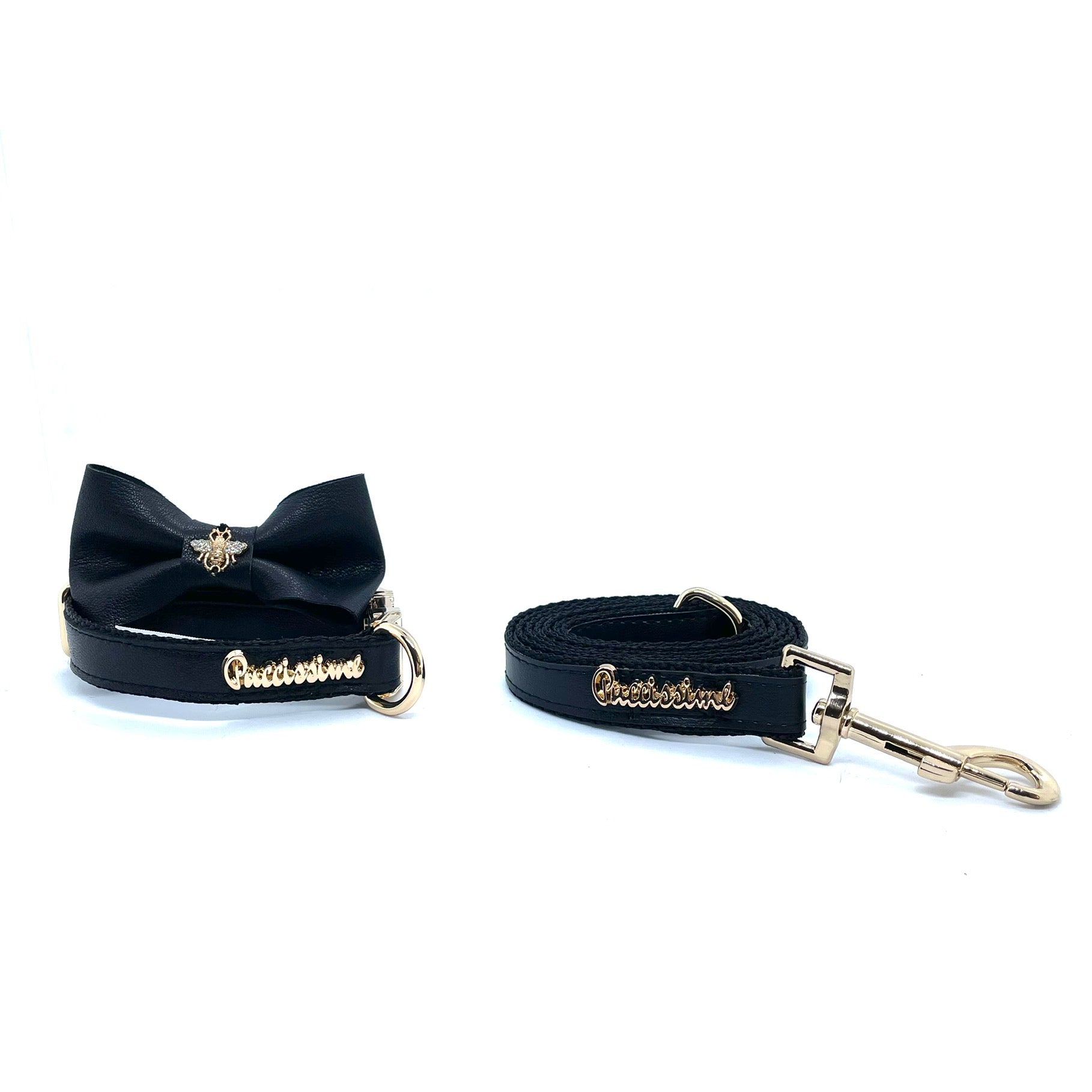 Ensemble Raven noir en cuir vegan pour chiens avec collier, laisse et nœud papillon.